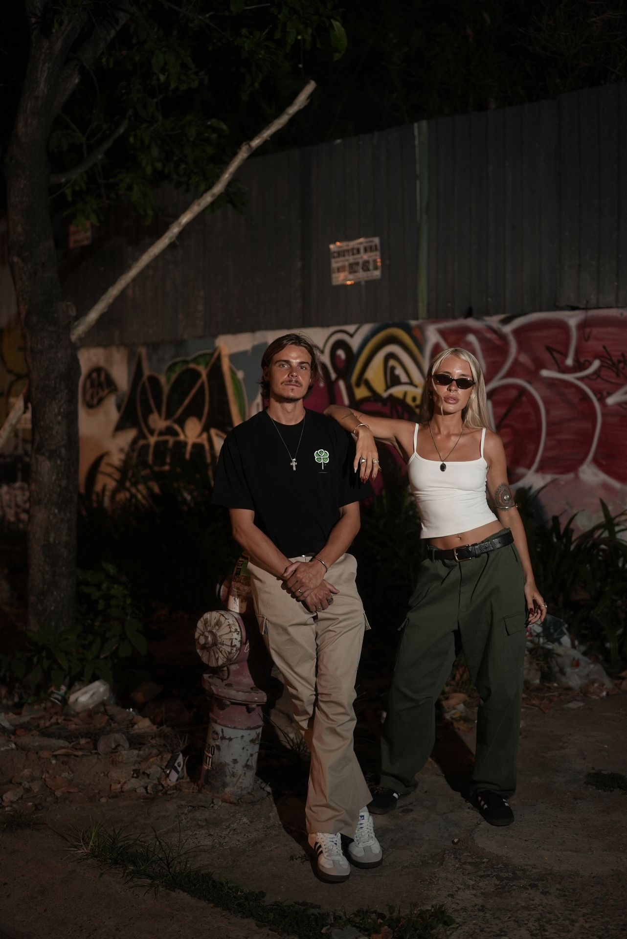 Emerald Exile - couple in Saigon alley